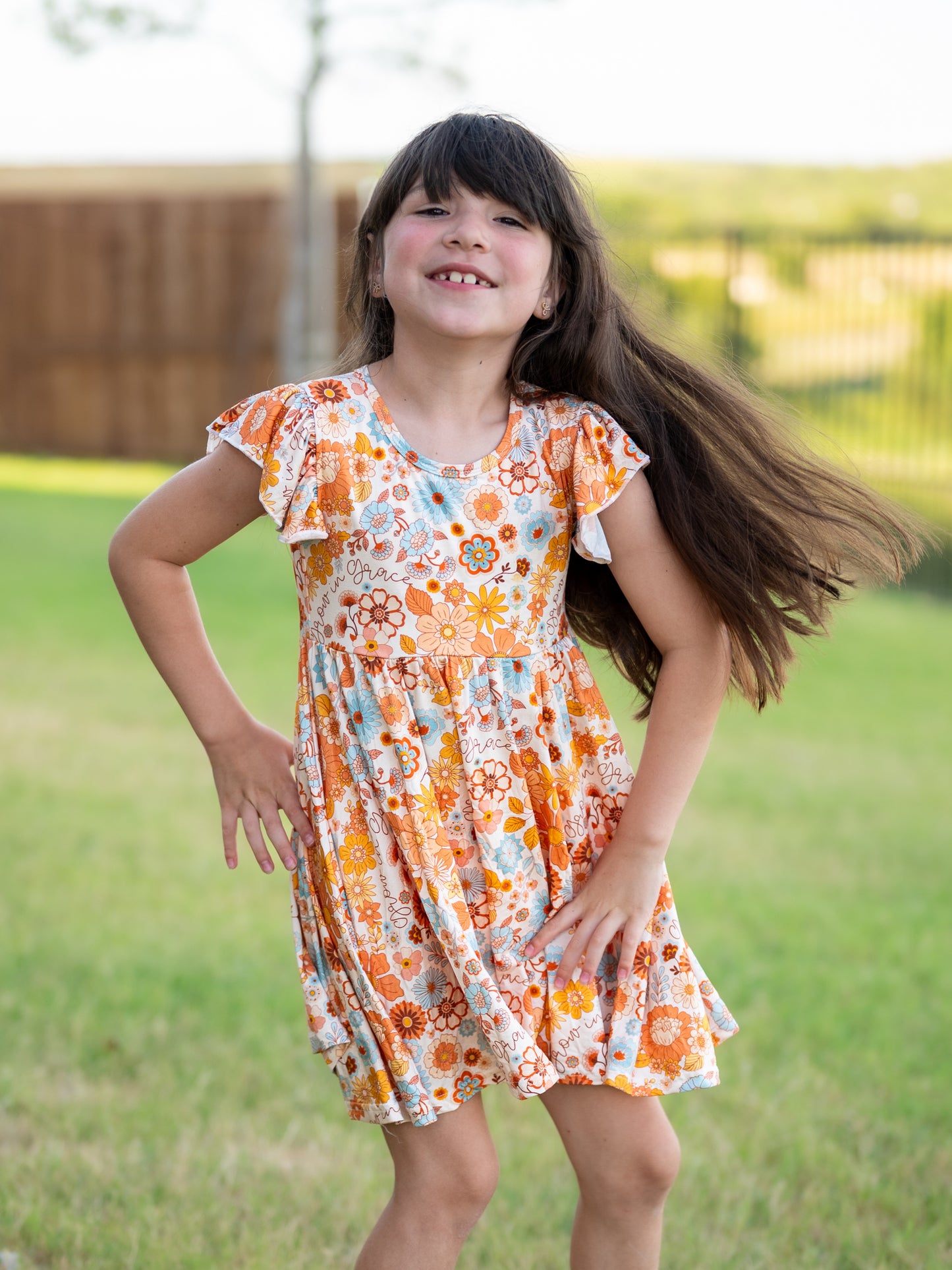Grow In Grace Ruffle Sleeve Tiered Twirl