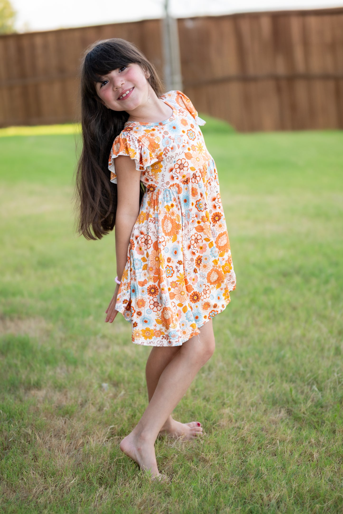 Grow In Grace Ruffle Sleeve Tiered Twirl